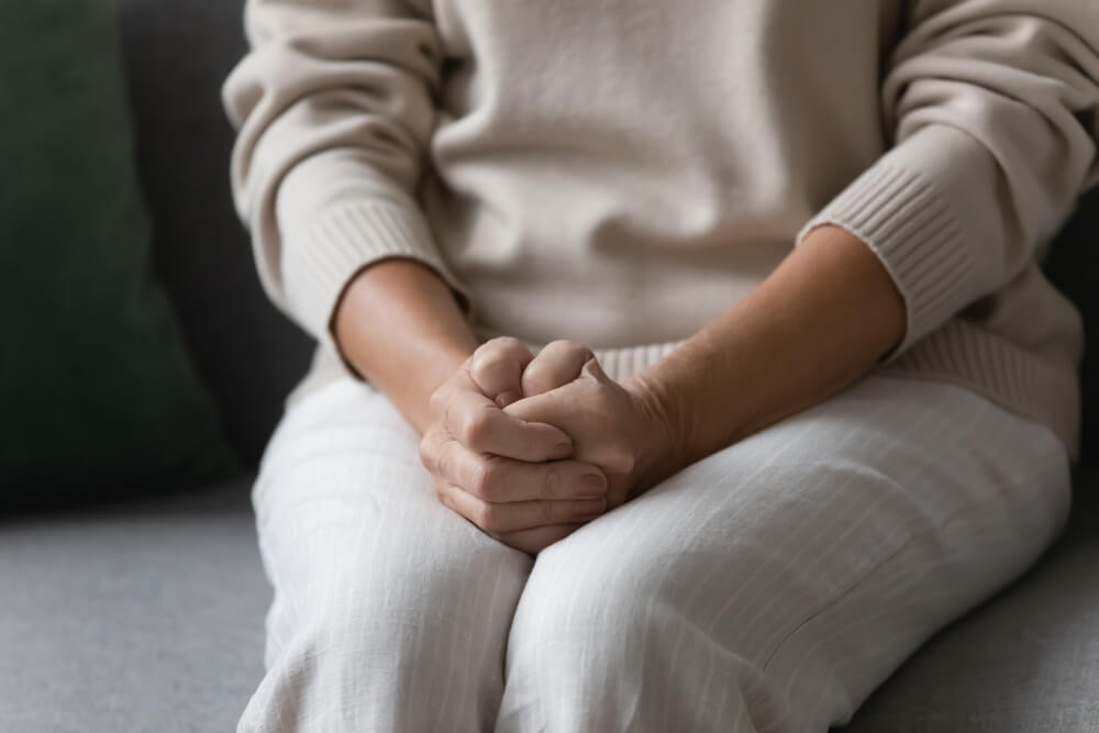 Elderly woman feels nervous anxious or lonely