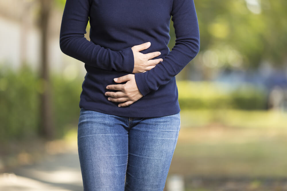 Woman Has Stomach Ache