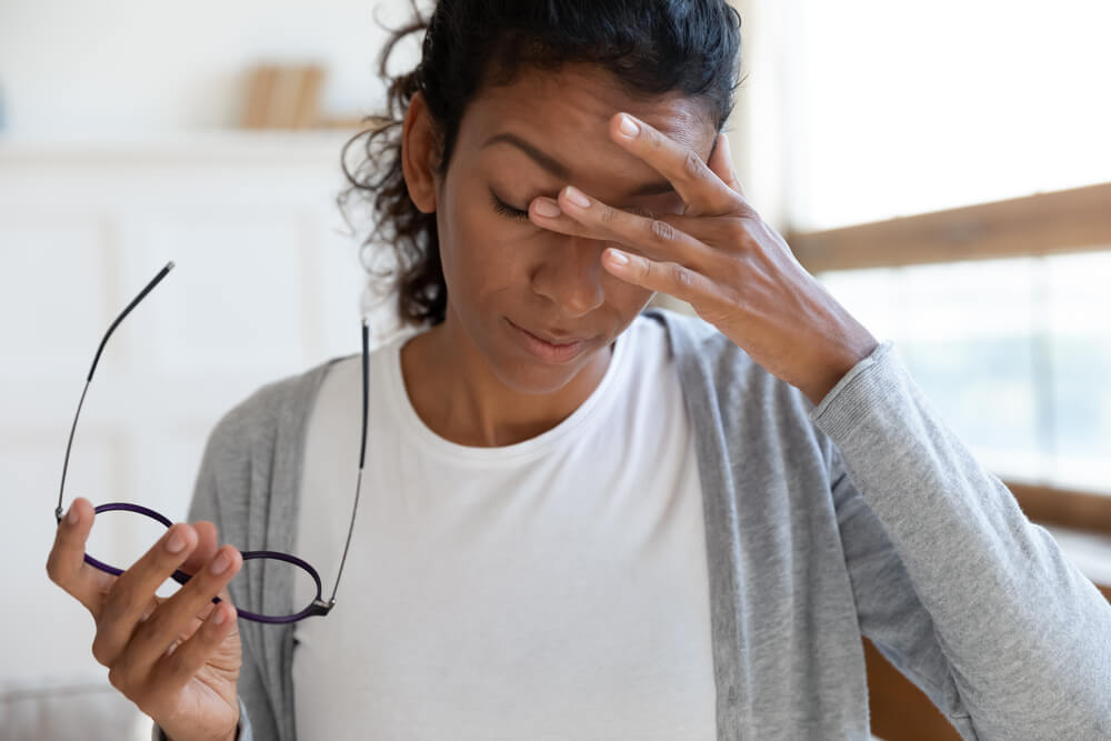 Woman eyes suffer from blurry vision or dizziness