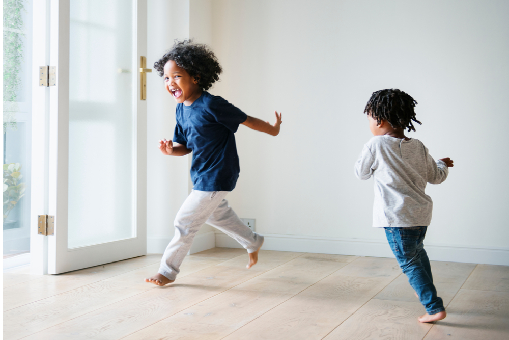 Young black boys playing in their house
