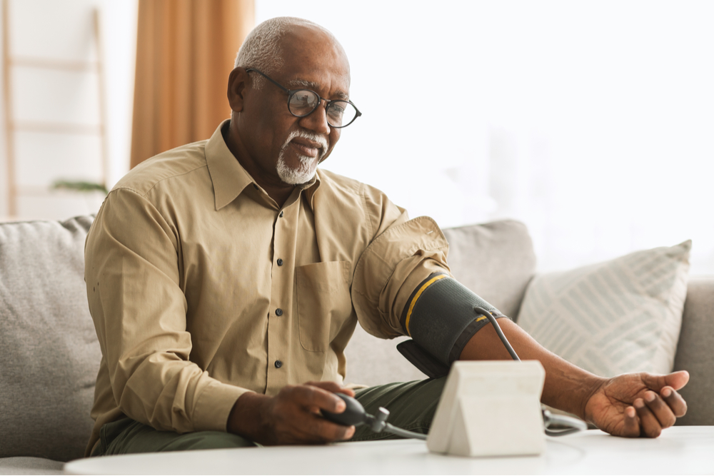 Man Measuring Arterial Blood Pressure