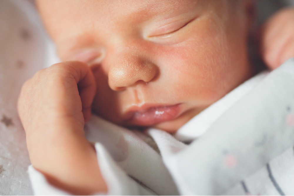 Newborn baby sleeps peacefully